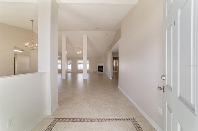 9896 SW 56th Ct, Ocala, FL 34476 - interior space featuring baseboards and an inviting chandelier