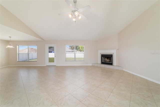 9896 SW 56th Ct, Ocala, FL 34476 - unfurnished living room featuring plenty of natural light, light tile patterned floors, and vaulted ceiling