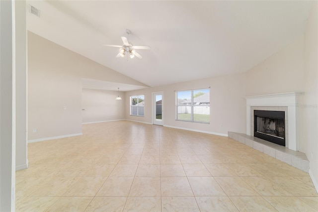 9896 SW 56th Ct, Ocala, FL 34476 - unfurnished living room featuring ceiling fan, light tile patterned floors, visible vents, a tile fireplace, and baseboards