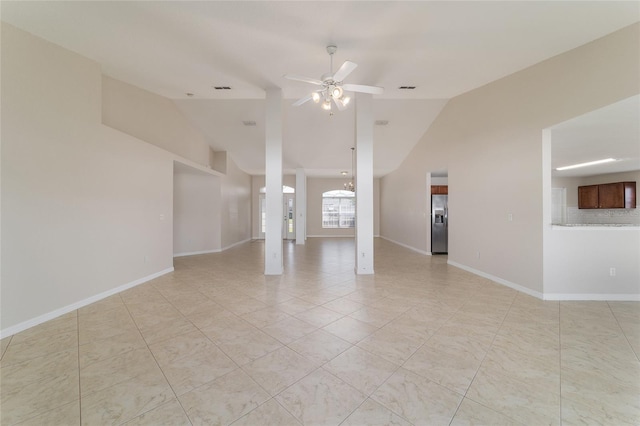 9896 SW 56th Ct, Ocala, FL 34476 - empty room featuring visible vents, ceiling fan, light tile patterned flooring, and vaulted ceiling