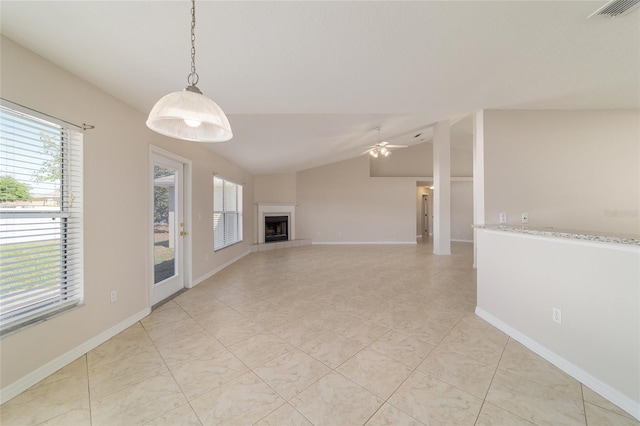 9896 SW 56th Ct, Ocala, FL 34476 - unfurnished living room featuring visible vents, ceiling fan, plenty of natural light, and a tile fireplace