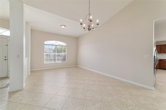 9896 SW 56th Ct, Ocala, FL 34476 - interior space featuring a notable chandelier, baseboards, vaulted ceiling, and light tile patterned flooring
