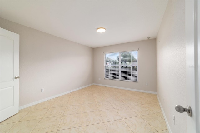 9896 SW 56th Ct, Ocala, FL 34476 - unfurnished room featuring baseboards and tile patterned flooring