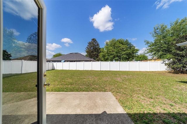 9896 SW 56th Ct, Ocala, FL 34476 - view of yard with a fenced backyard and a patio area