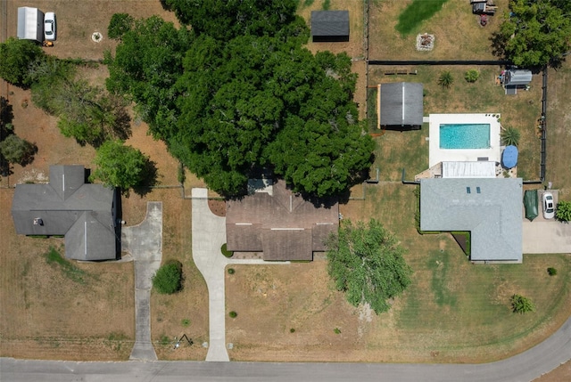 aerial view of property's location featuring a pool