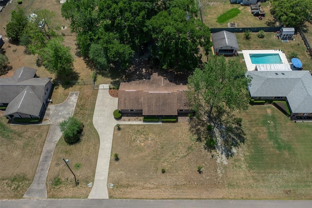 view of property location with a pool