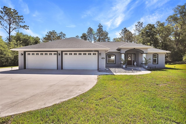 7407 SW 202nd Ct, Dunnellon, FL 34431 - ranch-style house with driveway, a garage, a front lawn, stucco siding, and roof with shingles