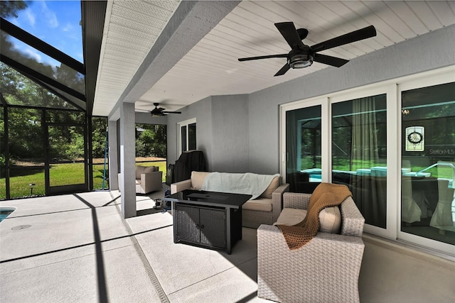 7407 SW 202nd Ct, Dunnellon, FL 34431 - sunroom / solarium featuring ceiling fan and an outdoor living space
