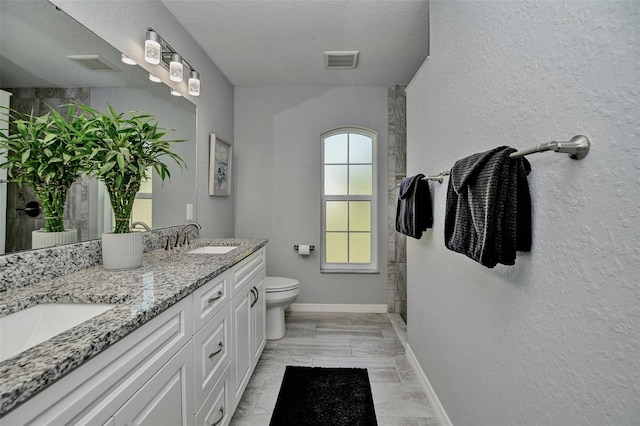 7407 SW 202nd Ct, Dunnellon, FL 34431 - full bathroom featuring marble finish floors, double vanity, a shower, and a textured wall