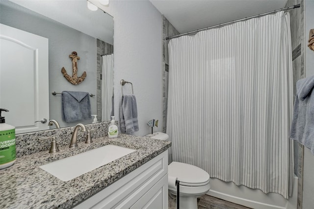 7407 SW 202nd Ct, Dunnellon, FL 34431 - full bath with vanity, wood finished floors, and shower / bathtub combination with curtain