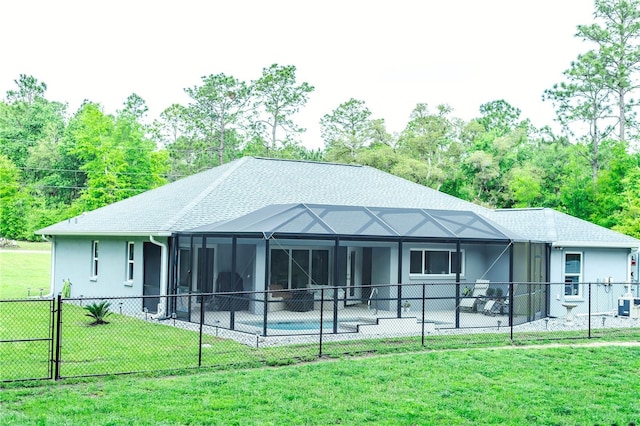 7407 SW 202nd Ct, Dunnellon, FL 34431 - rear view of property with a fenced backyard, stucco siding, a patio, and glass enclosure