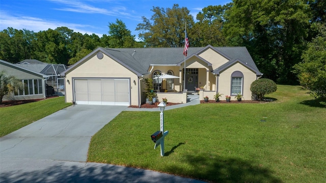 7692 SW 117th Street Rd, Ocala, FL 34476 - ranch-style house with a front lawn, driveway, a garage, and stucco siding
