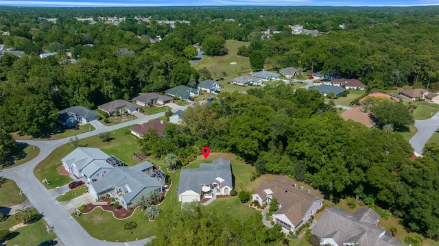7692 SW 117th Street Rd, Ocala, FL 34476 - aerial view featuring a view of trees and a residential view
