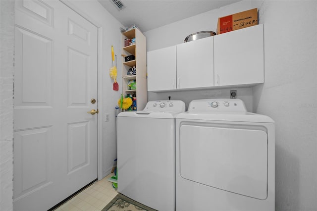7692 SW 117th Street Rd, Ocala, FL 34476 - washroom with cabinet space, visible vents, washing machine and dryer, and light floors