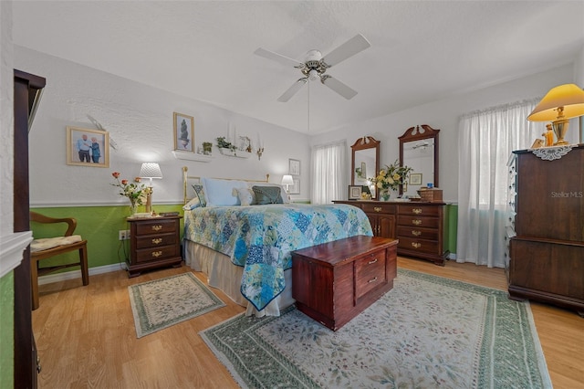 7692 SW 117th Street Rd, Ocala, FL 34476 - bedroom with ceiling fan, light wood-type flooring, and baseboards