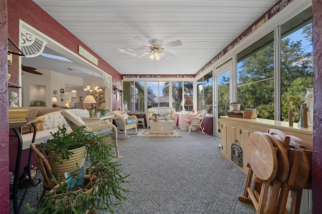 7692 SW 117th Street Rd, Ocala, FL 34476 - sunroom / solarium with french doors, ceiling fan with notable chandelier, and an outdoor hangout area
