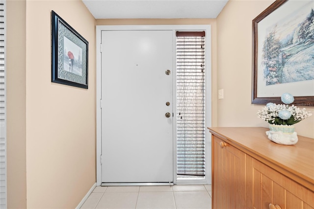 2756 Clubhouse Dr Unit 101, Sarasota, FL 34232 - foyer featuring light tile patterned floors