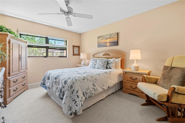 2756 Clubhouse Dr Unit 101, Sarasota, FL 34232 - bedroom featuring a ceiling fan, light colored carpet, and a textured ceiling