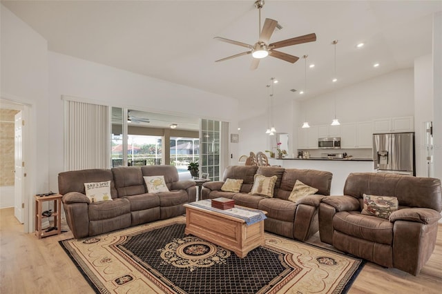 4277 E Bennett St, Inverness, FL 34453 - living room featuring high vaulted ceiling, recessed lighting, light wood finished floors, and a ceiling fan