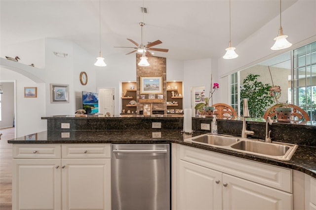 4277 E Bennett St, Inverness, FL 34453 - kitchen featuring open floor plan, white cabinets, ceiling fan, dishwasher, and a sink
