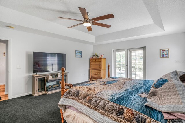 4277 E Bennett St, Inverness, FL 34453 - bedroom with a tray ceiling, access to outside, carpet flooring, and baseboards