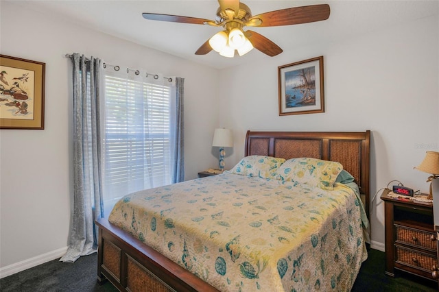 4277 E Bennett St, Inverness, FL 34453 - bedroom with dark carpet, baseboards, and ceiling fan