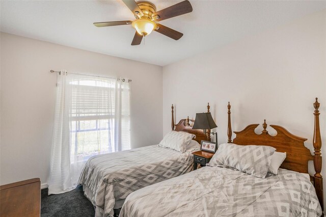 4277 E Bennett St, Inverness, FL 34453 - bedroom with carpet floors and a ceiling fan