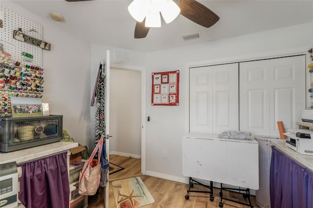 4277 E Bennett St, Inverness, FL 34453 - home office featuring light wood-style floors, baseboards, a ceiling fan, and visible vents