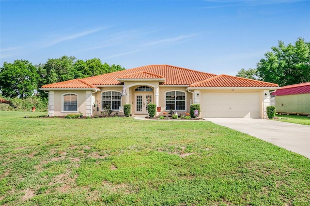 4277 E Bennett St, Inverness, FL 34453 - mediterranean / spanish-style home with a garage, concrete driveway, a tile roof, stucco siding, and a front lawn