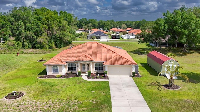 4277 E Bennett St, Inverness, FL 34453 - mediterranean / spanish-style house with driveway, french doors, a front lawn, a garage, and a tiled roof