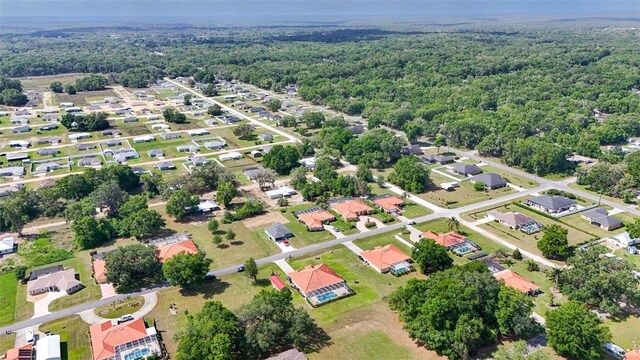 4277 E Bennett St, Inverness, FL 34453 - bird's eye view featuring a forest view and a residential view