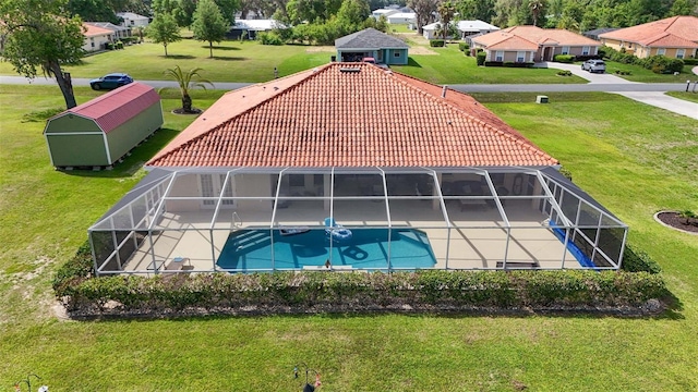 4277 E Bennett St, Inverness, FL 34453 - outdoor pool with a patio area, a residential view, a yard, and glass enclosure