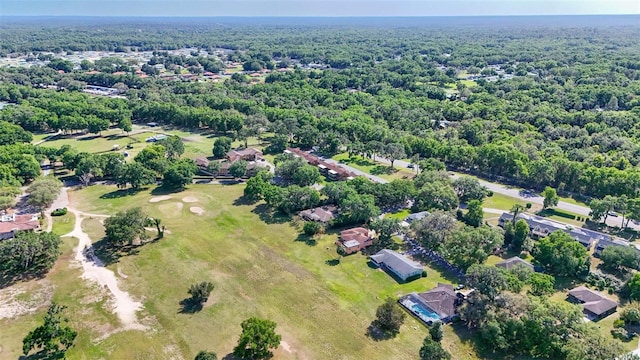4401 E Windmill Dr, Inverness, FL 34453 - aerial view featuring a wooded view