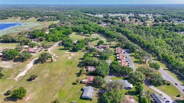 4401 E Windmill Dr, Inverness, FL 34453 - drone / aerial view featuring view of golf course and a water view