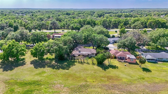 4401 E Windmill Dr, Inverness, FL 34453 - drone / aerial view with a forest view and a residential view