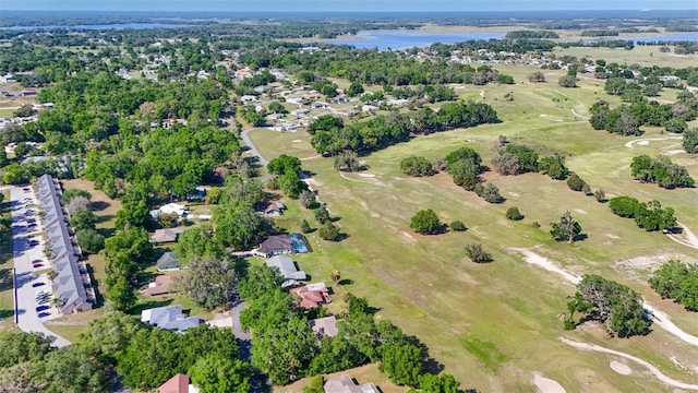 4401 E Windmill Dr, Inverness, FL 34453 - birds eye view of property featuring view of golf course and a water view