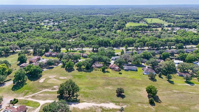 4401 E Windmill Dr, Inverness, FL 34453 - birds eye view of property with a view of trees, a residential view, and golf course view