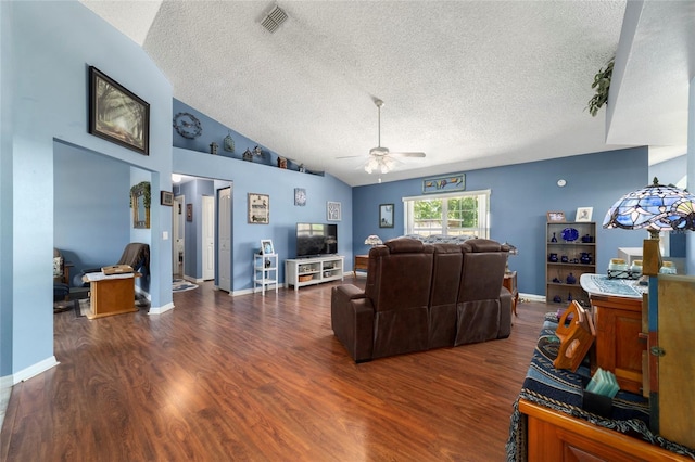 living room featuring vaulted ceiling, a textured ceiling, visible vents, ceiling fan, and wood finished floors