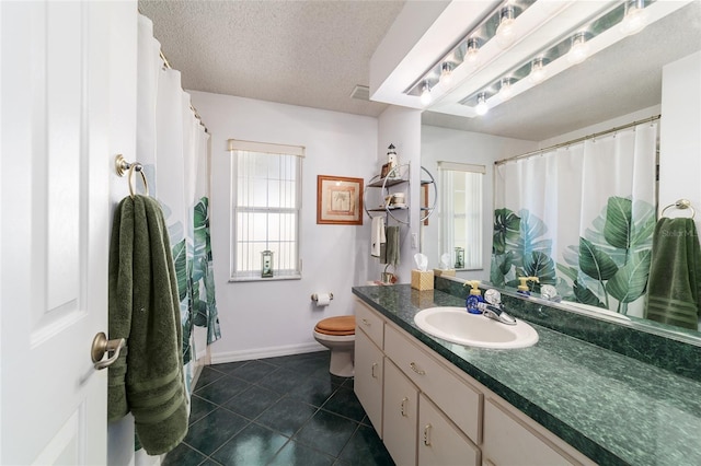 bathroom with vanity, baseboards, tile patterned floors, toilet, and visible vents