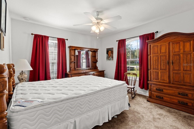 bedroom featuring carpet flooring and a ceiling fan