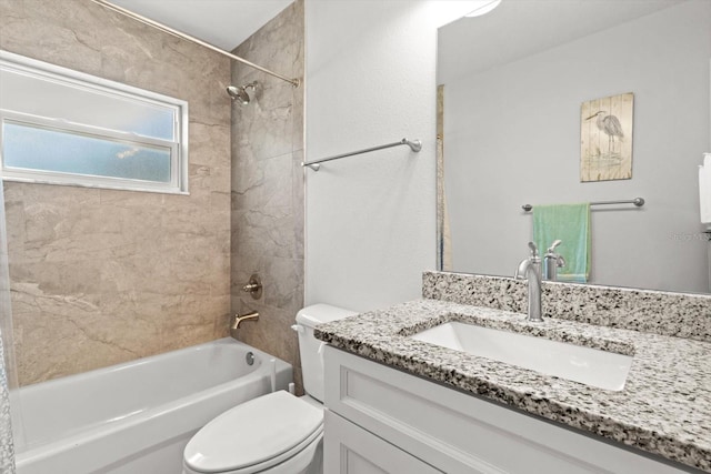 full bathroom with toilet, vanity, and washtub / shower combination