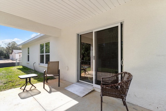 view of patio with fence
