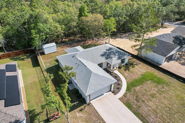 aerial view featuring a wooded view