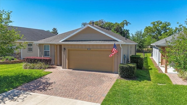 3918 NW 46th Ter, Ocala, FL 34482 - ranch-style home with decorative driveway, a front lawn, and a garage