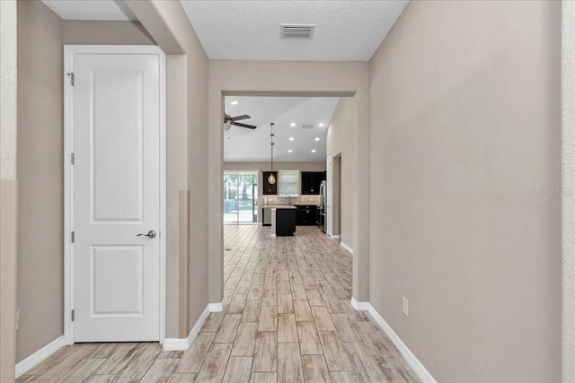 3918 NW 46th Ter, Ocala, FL 34482 - corridor featuring recessed lighting, visible vents, baseboards, and light wood-type flooring