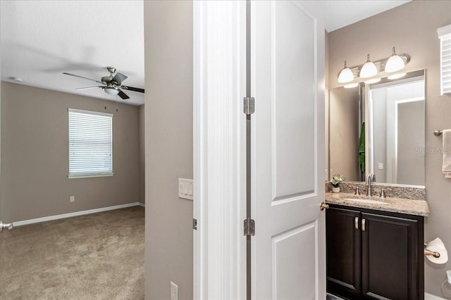 3918 NW 46th Ter, Ocala, FL 34482 - bathroom with ceiling fan, vanity, and baseboards