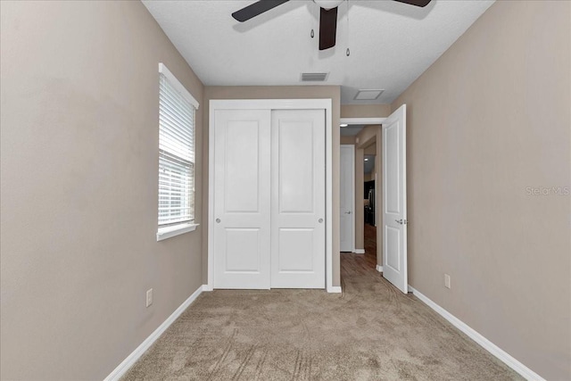 3918 NW 46th Ter, Ocala, FL 34482 - unfurnished bedroom featuring carpet, visible vents, baseboards, and a closet