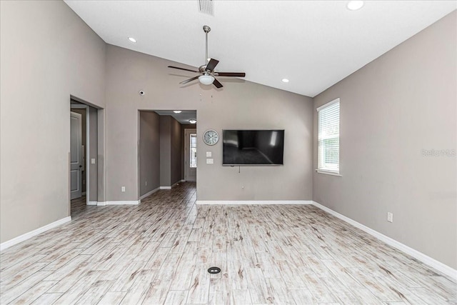 3918 NW 46th Ter, Ocala, FL 34482 - unfurnished living room with ceiling fan, visible vents, vaulted ceiling, baseboards, and wood finished floors