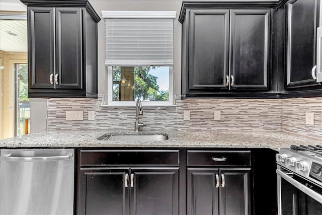 3918 NW 46th Ter, Ocala, FL 34482 - kitchen featuring stainless steel appliances, backsplash, plenty of natural light, and a sink