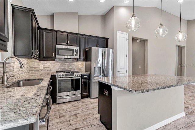 3918 NW 46th Ter, Ocala, FL 34482 - kitchen with light stone countertops, stainless steel appliances, backsplash, and a sink